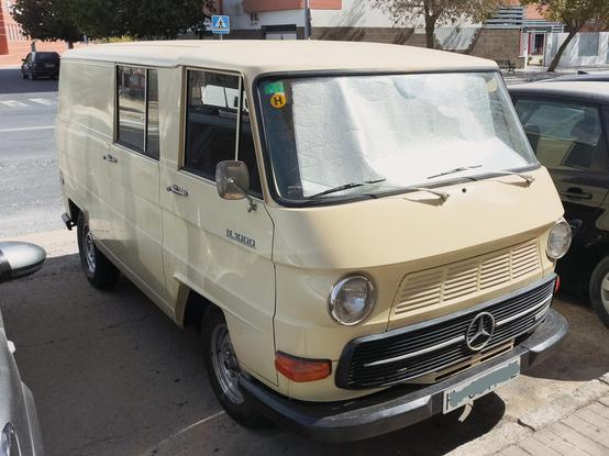 A modest size van in cream with a recessed moulding bwtween the headlights, housing a second grille in body colour. It has a distinct, functional Eastern bloc look